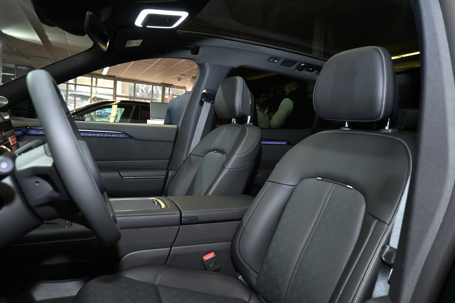 Black leather front seats with illuminated trim