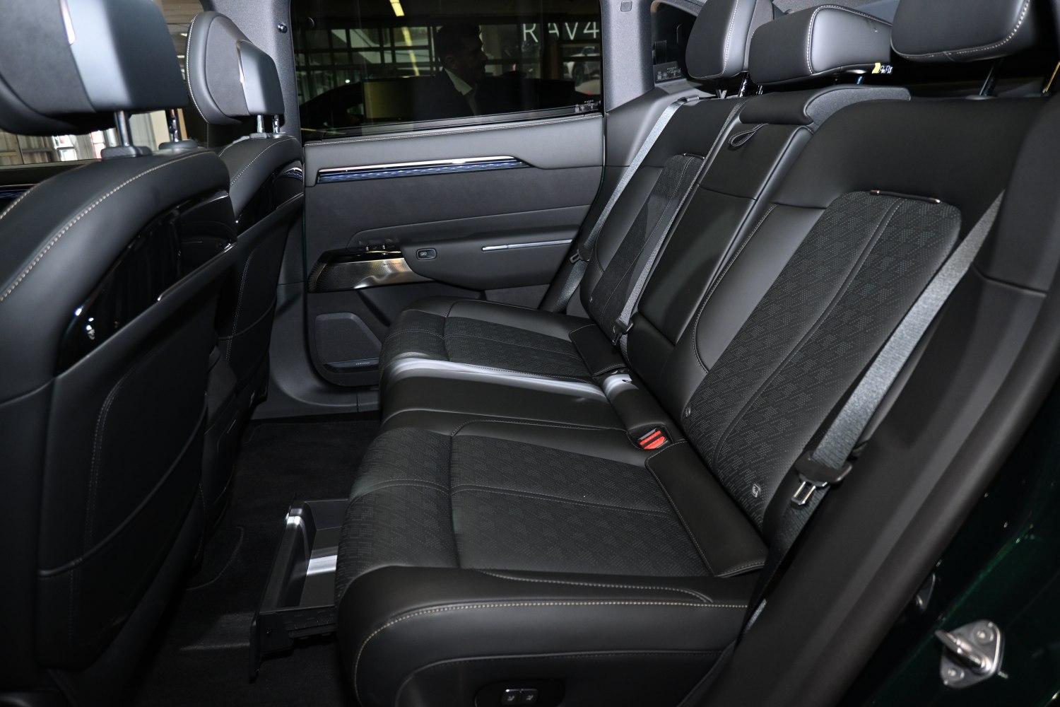 Premium rear seat with leather upholstery and seat belts.