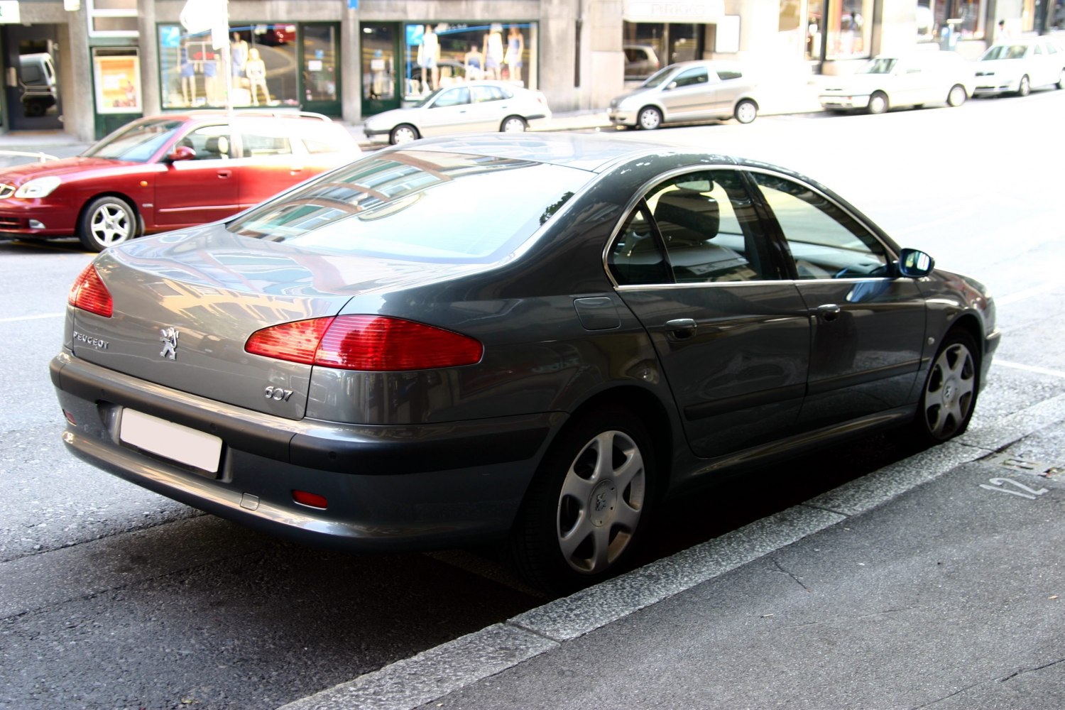 Rear side view with smooth body lines and distinctive rear lights
