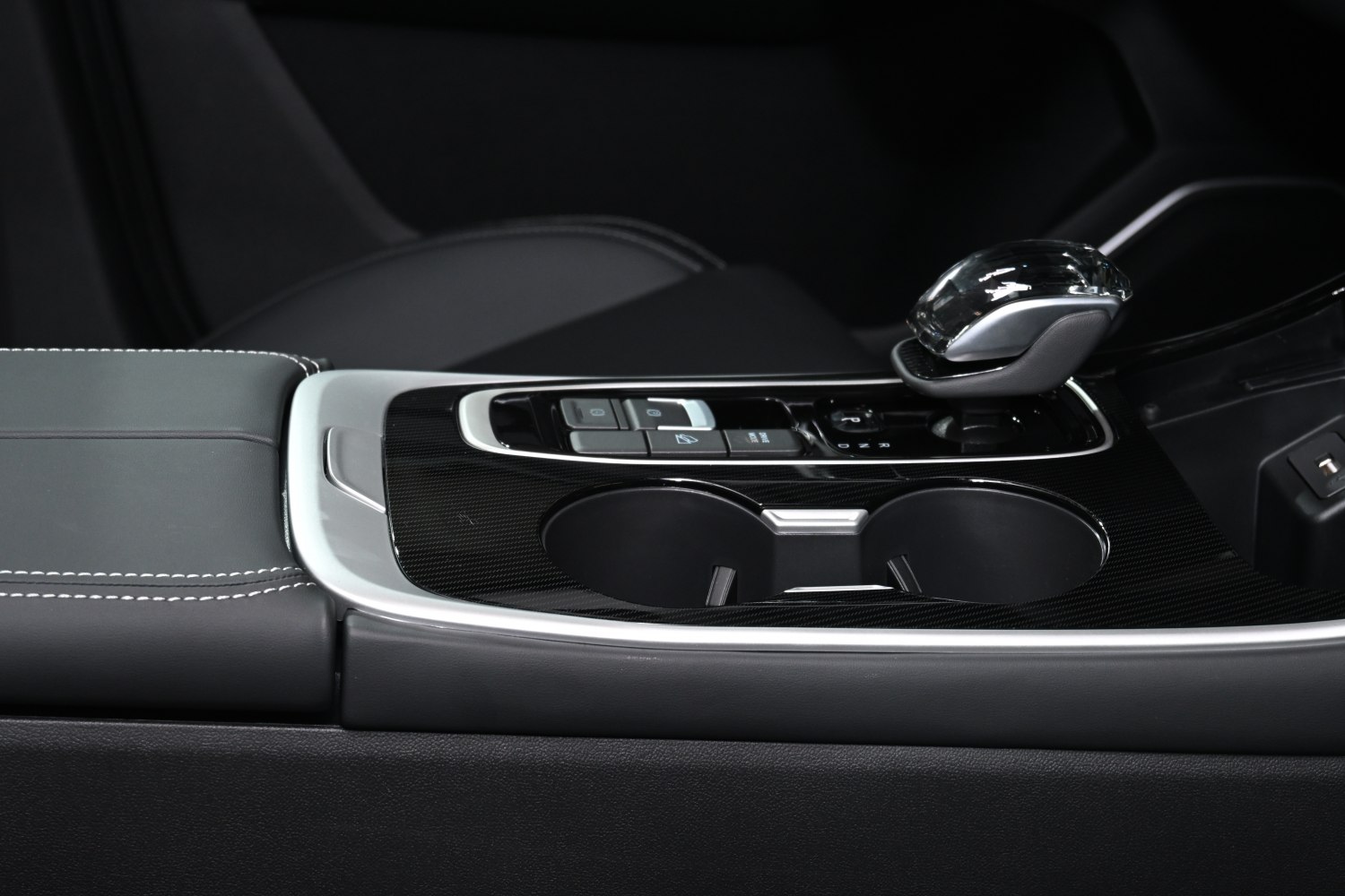 Crystal gear shifter and modern center console with control buttons