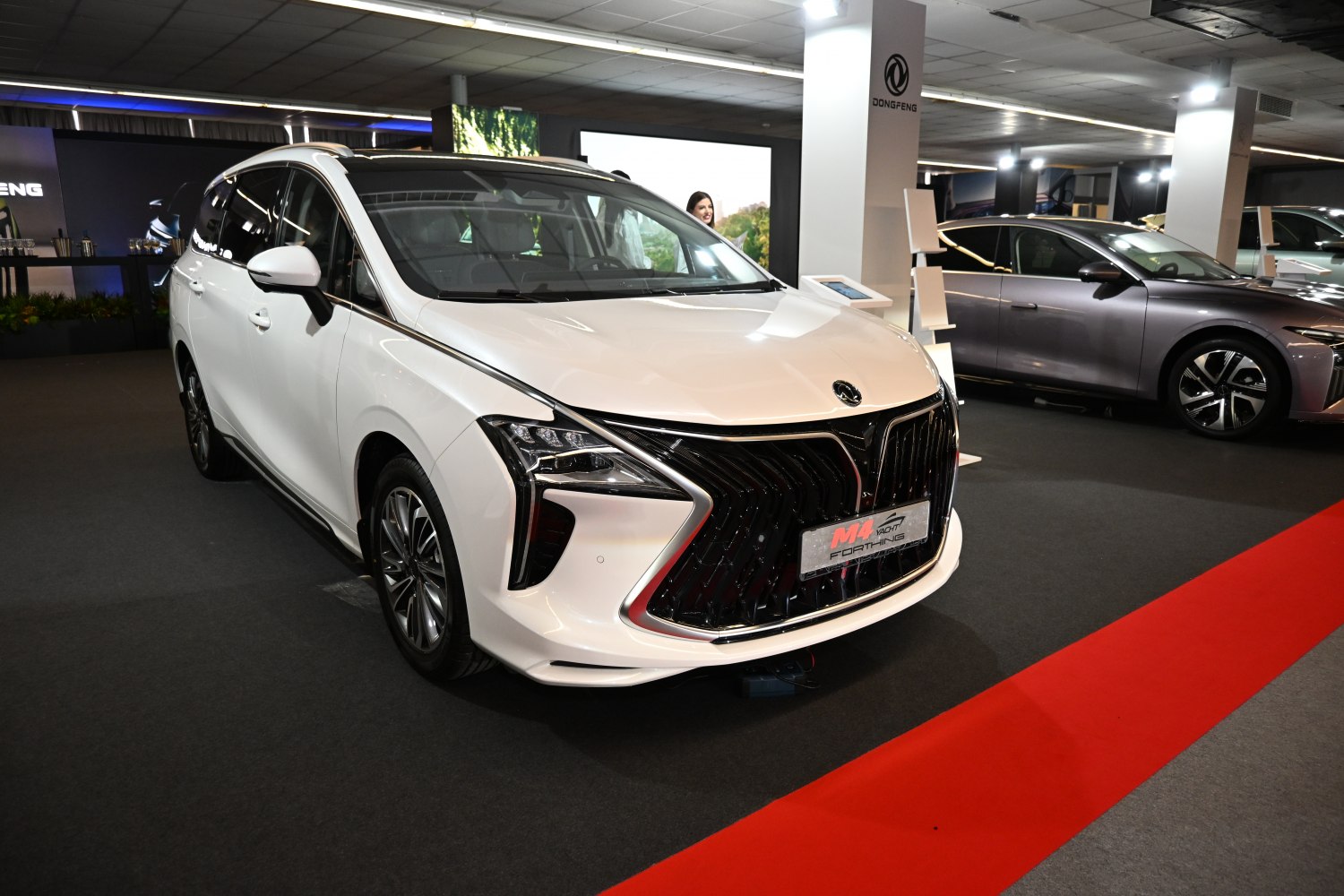Front view with large angular grille and LED headlights