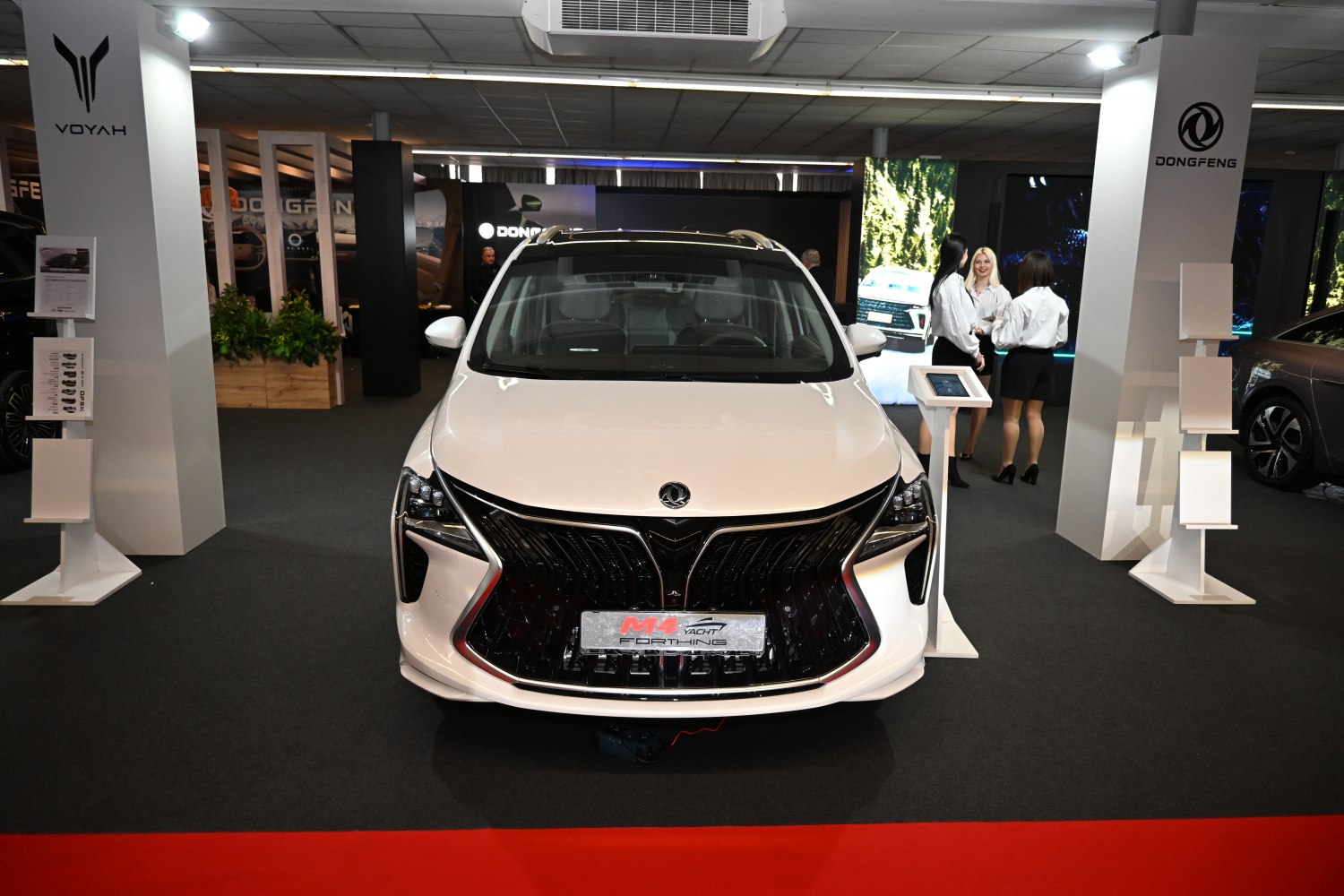Bold front grille and LED headlights on an exhibition SUV.