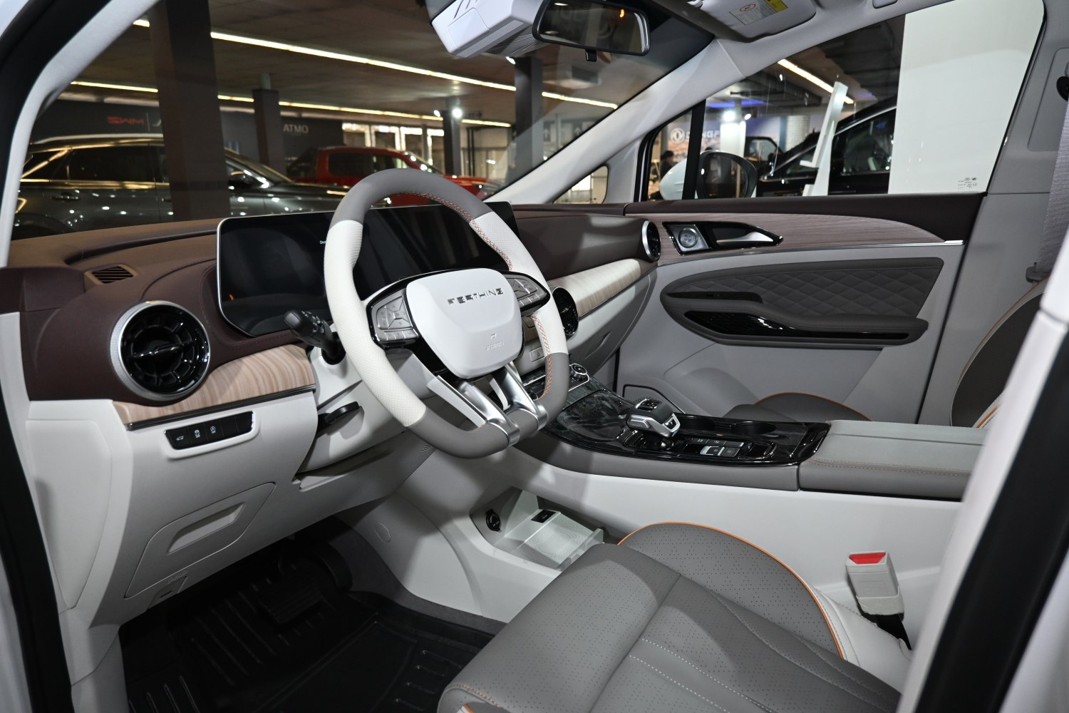 Luxury interior with digital dashboard and multifunction steering wheel