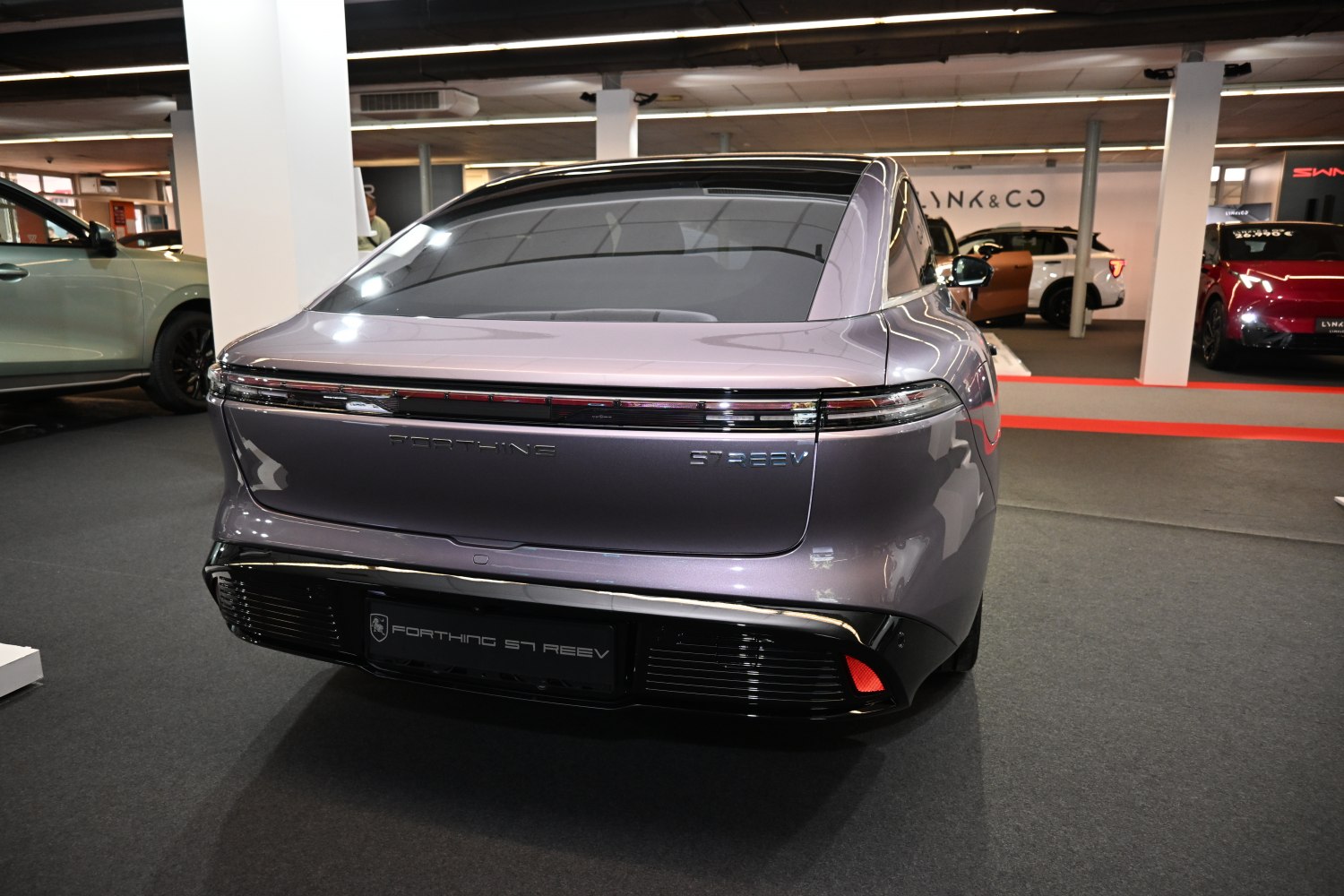Sleek rear design with full-width LED tail light and integrated bumper details