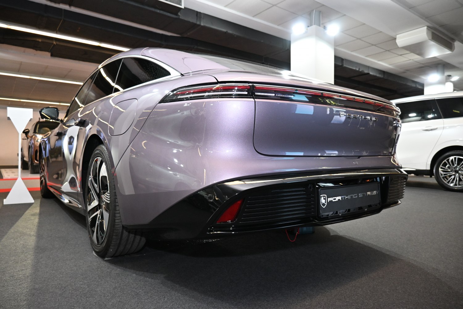 Sleek rear with continuous LED tail lights and modern rear bumper design
