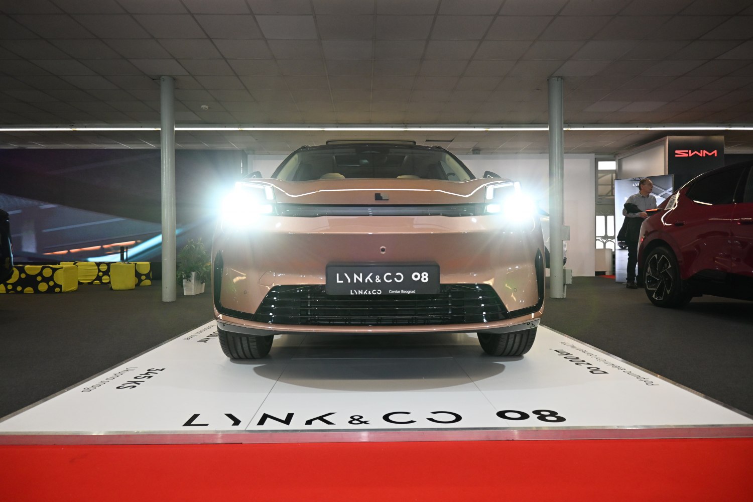Front view of vehicle with LED headlights and modern grille