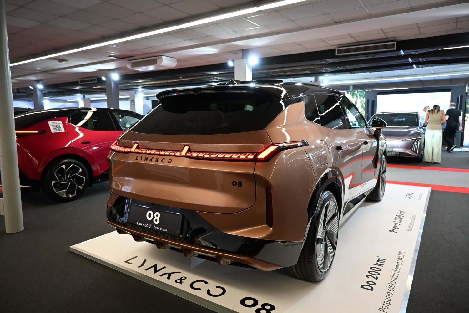 Rear view of sleek modern SUV with LED taillights.