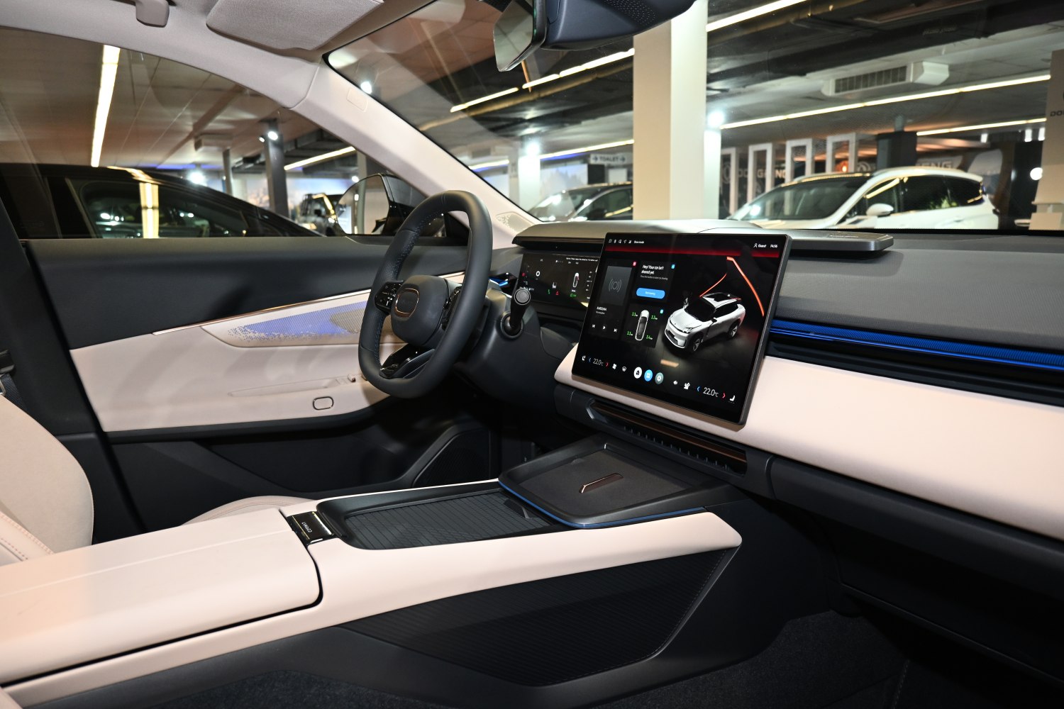 Modern car interior with digital dashboard and large touchscreen display