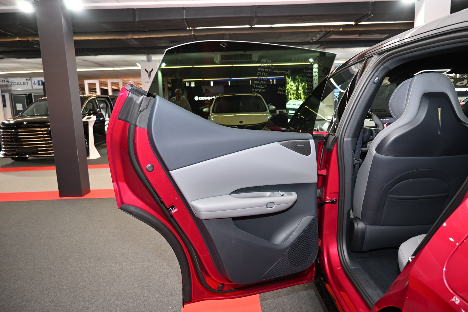 Rear passenger door interior panel with modern design and seating