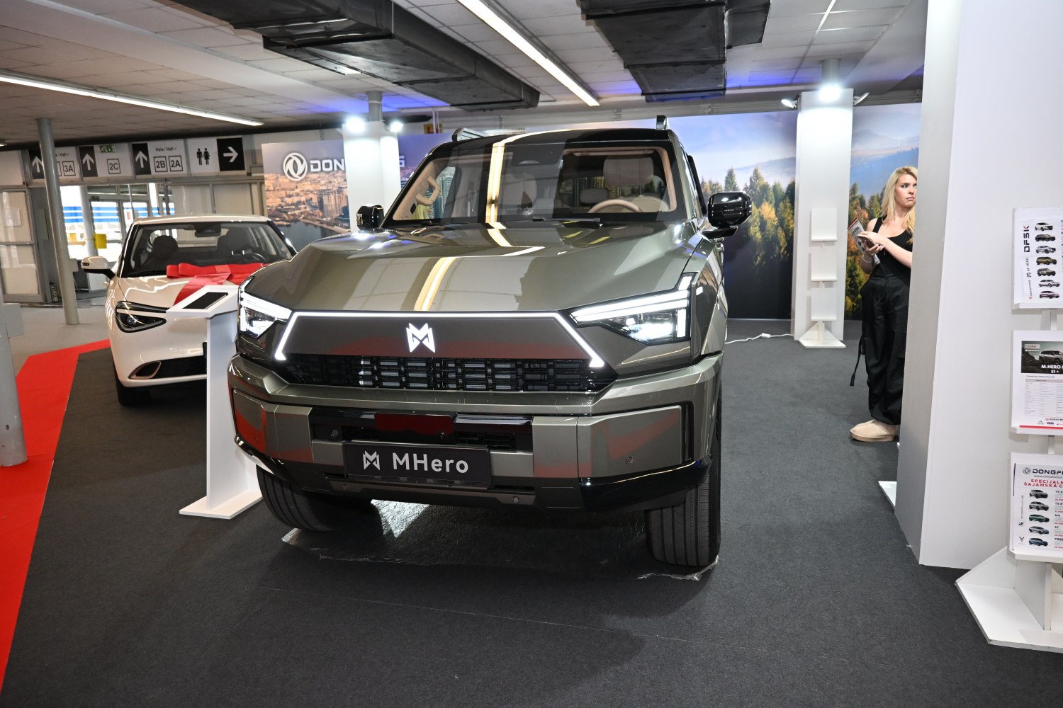 Front view of SUV with LED headlights and bold grille