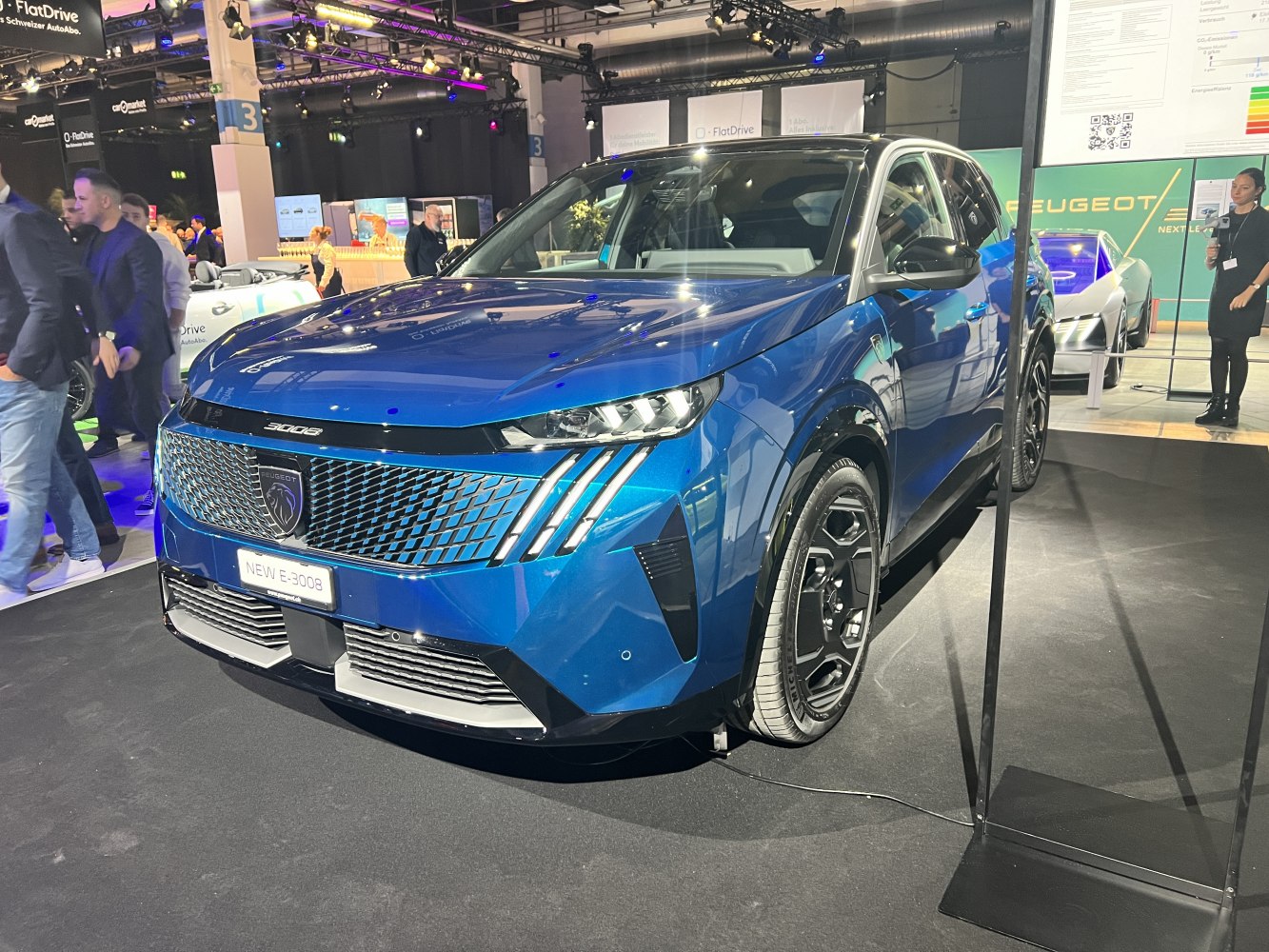 Front view of SUV with detailed grille and sleek headlights