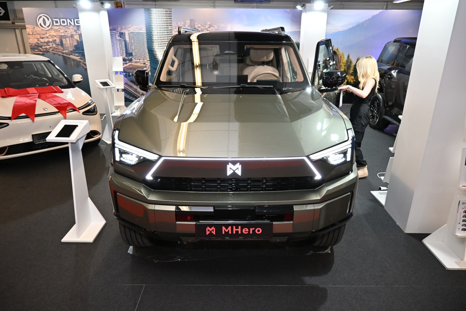 Front view with LED daytime running lights and bold grille design