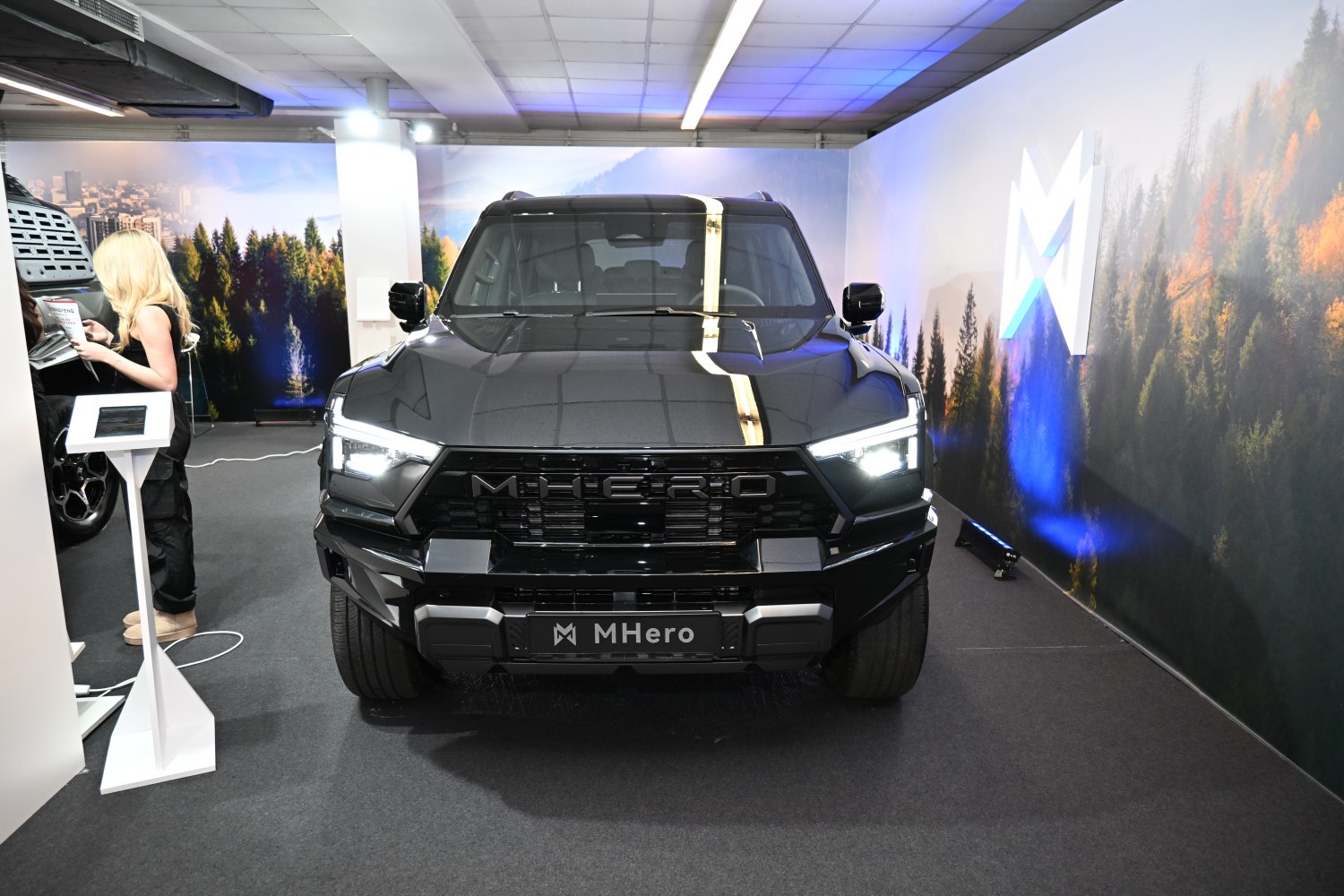 Front view of pickup truck showcasing grille and LED headlights