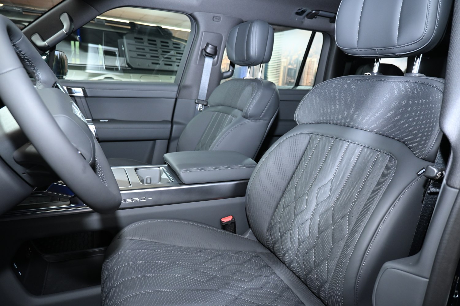 Premium leather seats with detailed stitching and ergonomic design
