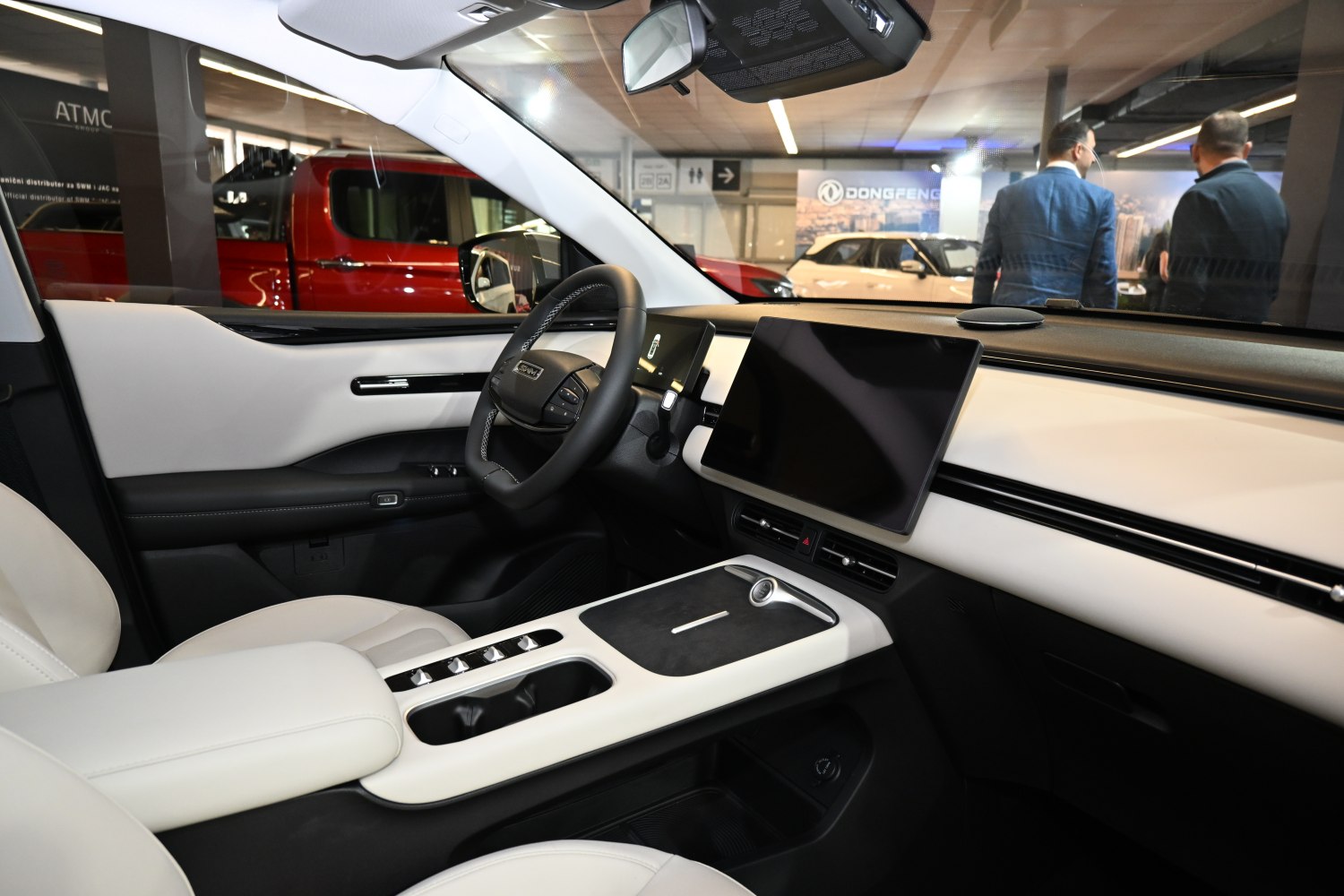 Modern dashboard and steering wheel in sleek minimalist car interior