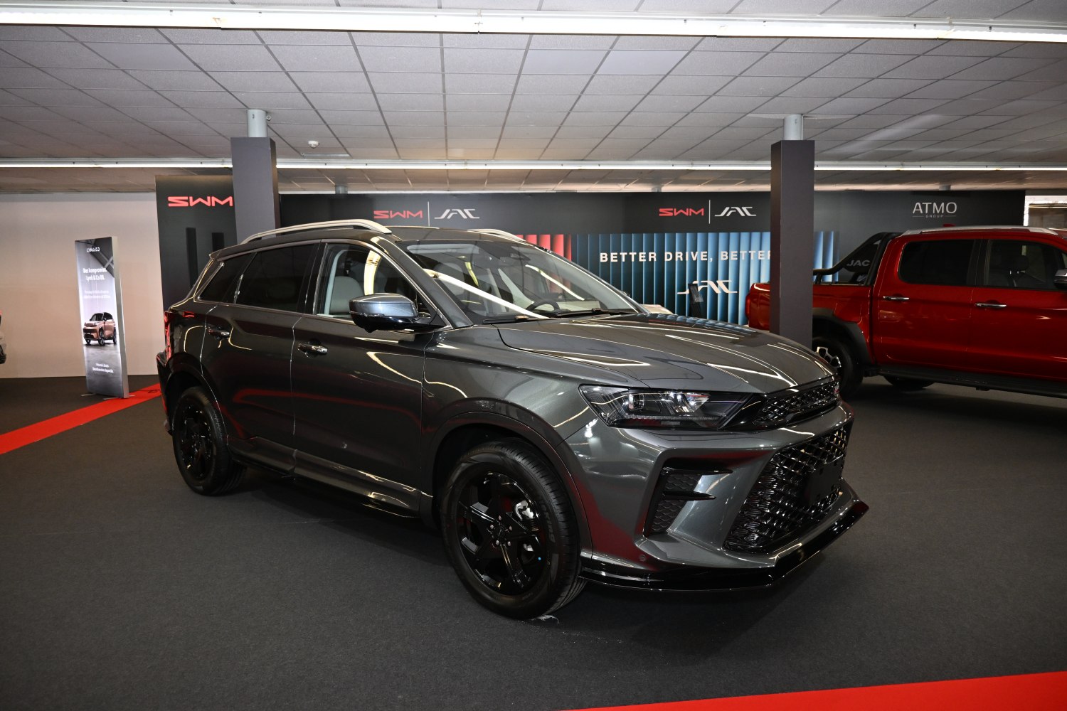 Sporty SUV with aggressive front grille and black alloy wheels