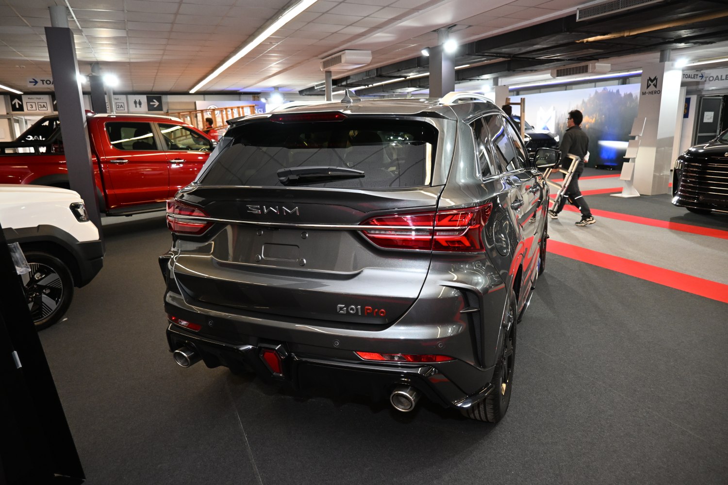 Rear view of SUV with dual exhaust and sleek taillights
