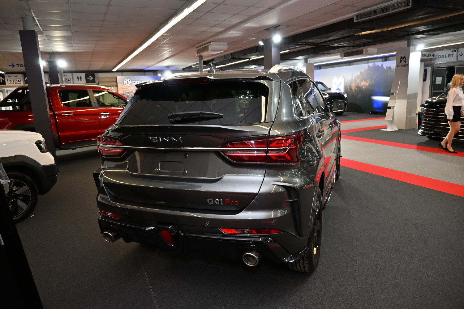 Rear view of SUV with dual exhaust and modern taillights
