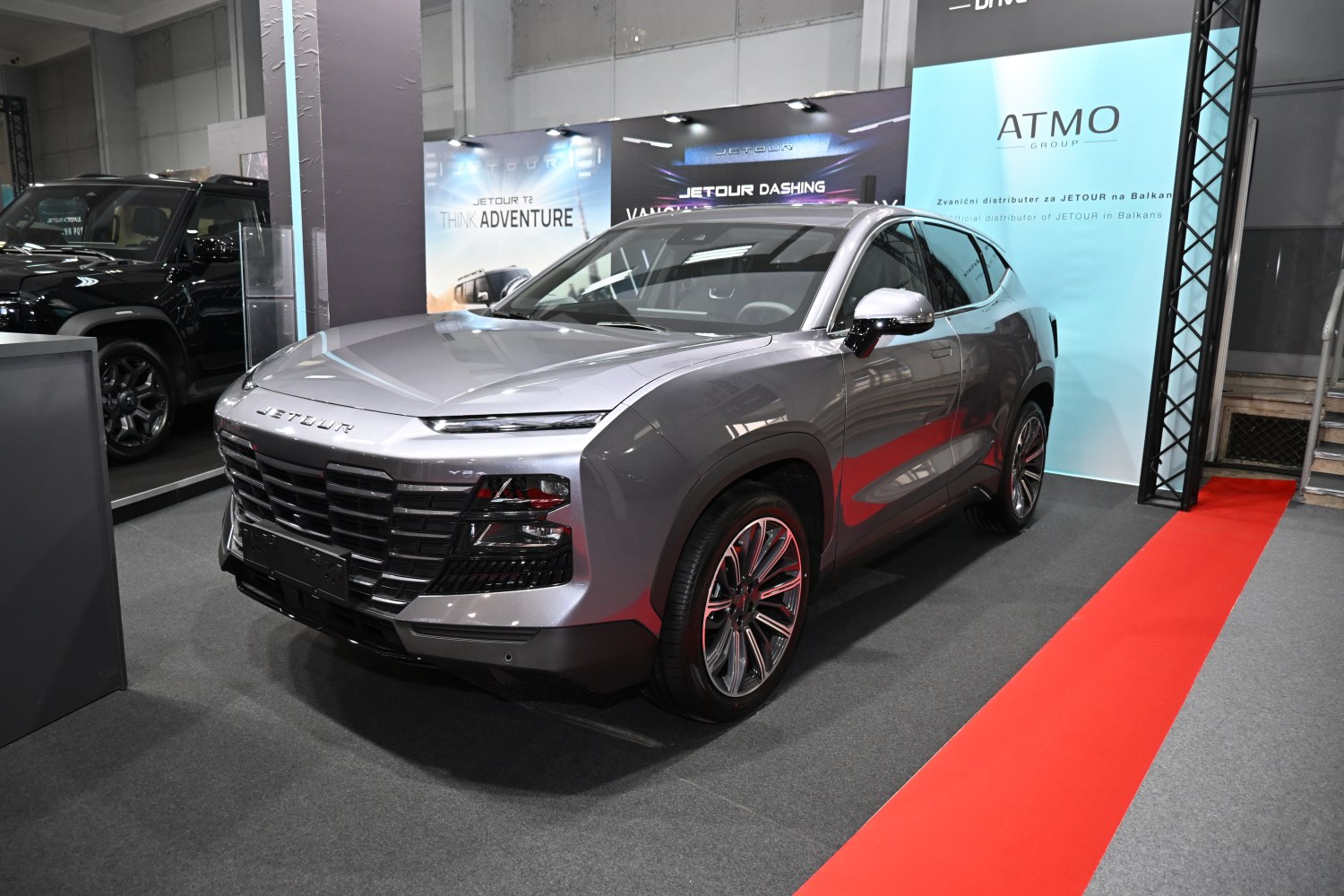Sleek front grille and slim LED headlights on a modern SUV