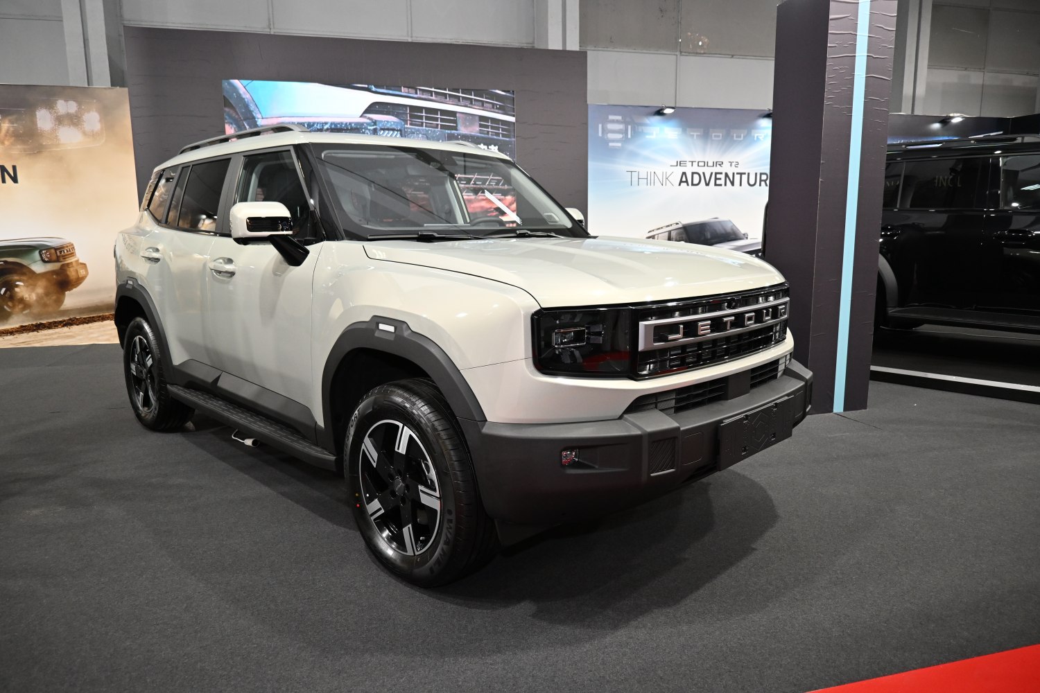 Rugged SUV design with bold grille and alloy wheels