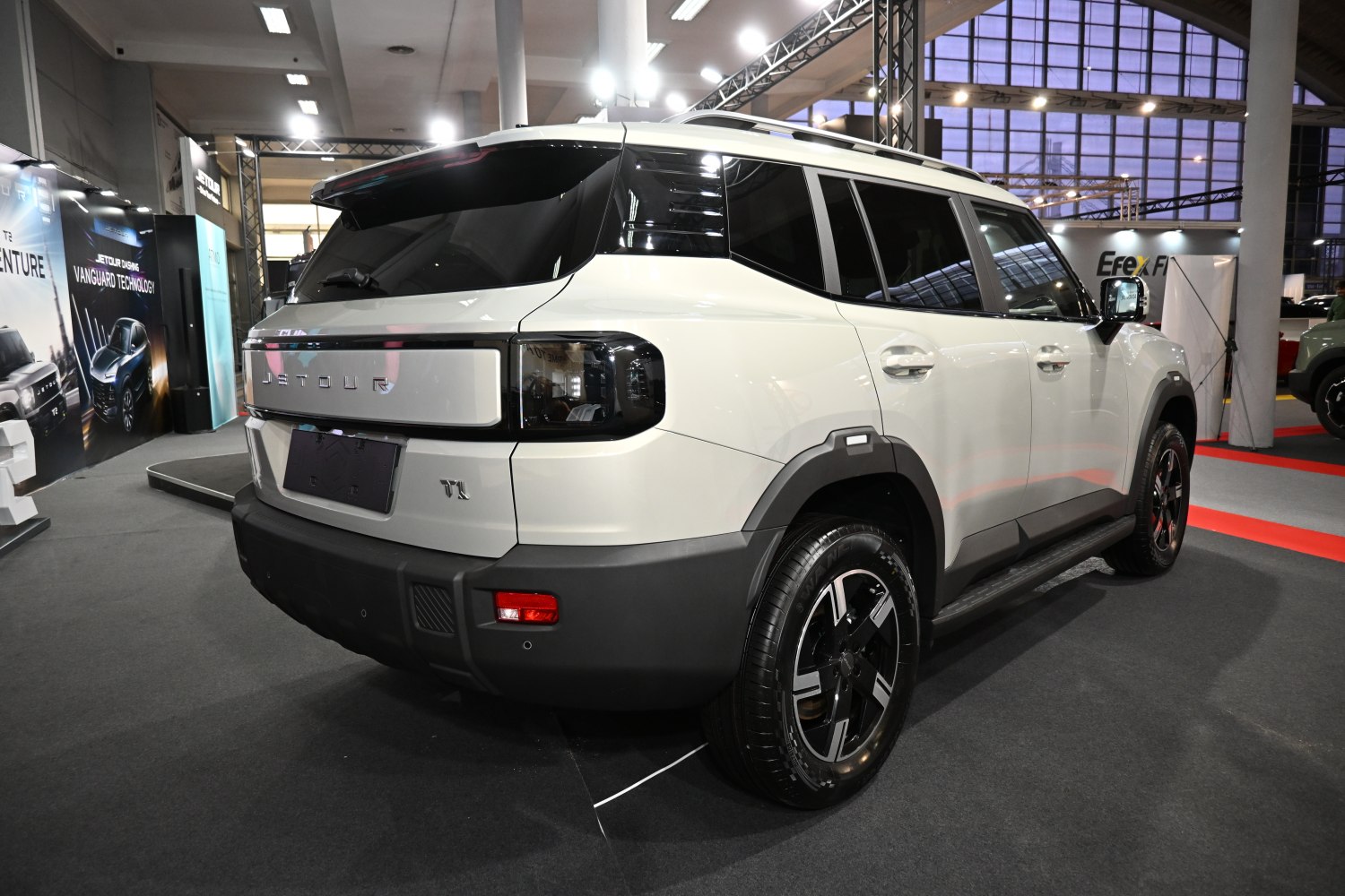 Rear side view with modern tail lights and robust SUV design