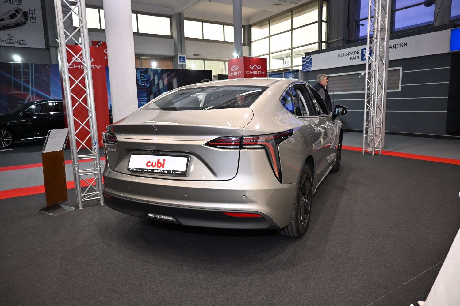 Rear view of modern sleek sedan with distinctive vertical taillights
