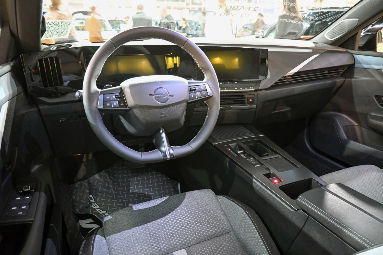 Digital dashboard and large touchscreen infotainment system in car interior
