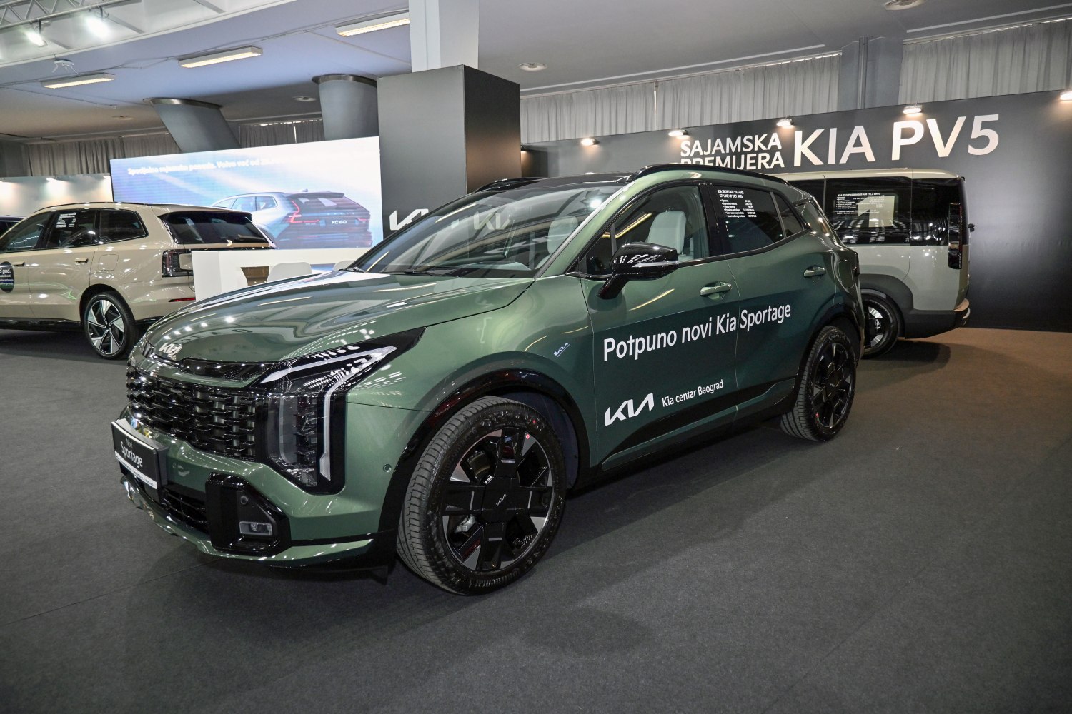 Front and side view with vertical LED headlights and black alloy wheels