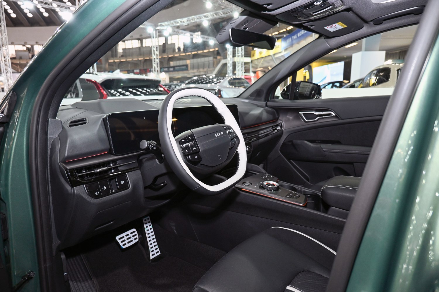 Modern digital dual-screen dashboard and uniquely designed steering wheel