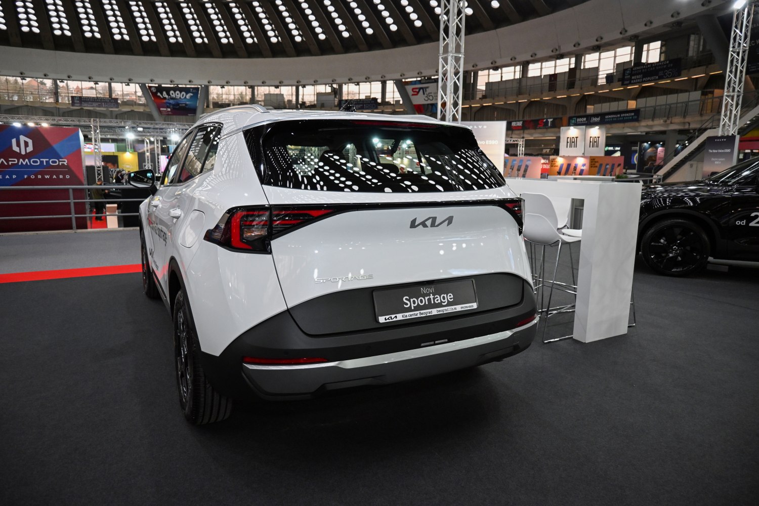 Sleek rear design and taillights of a modern SUV in white.