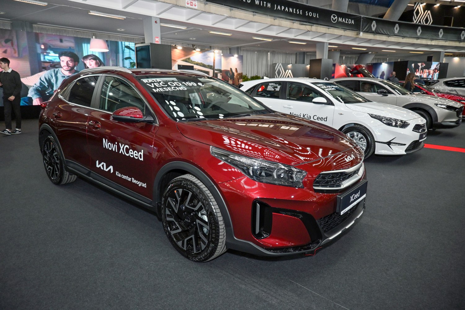Front three-quarter view with sharp headlights and stylish wheels