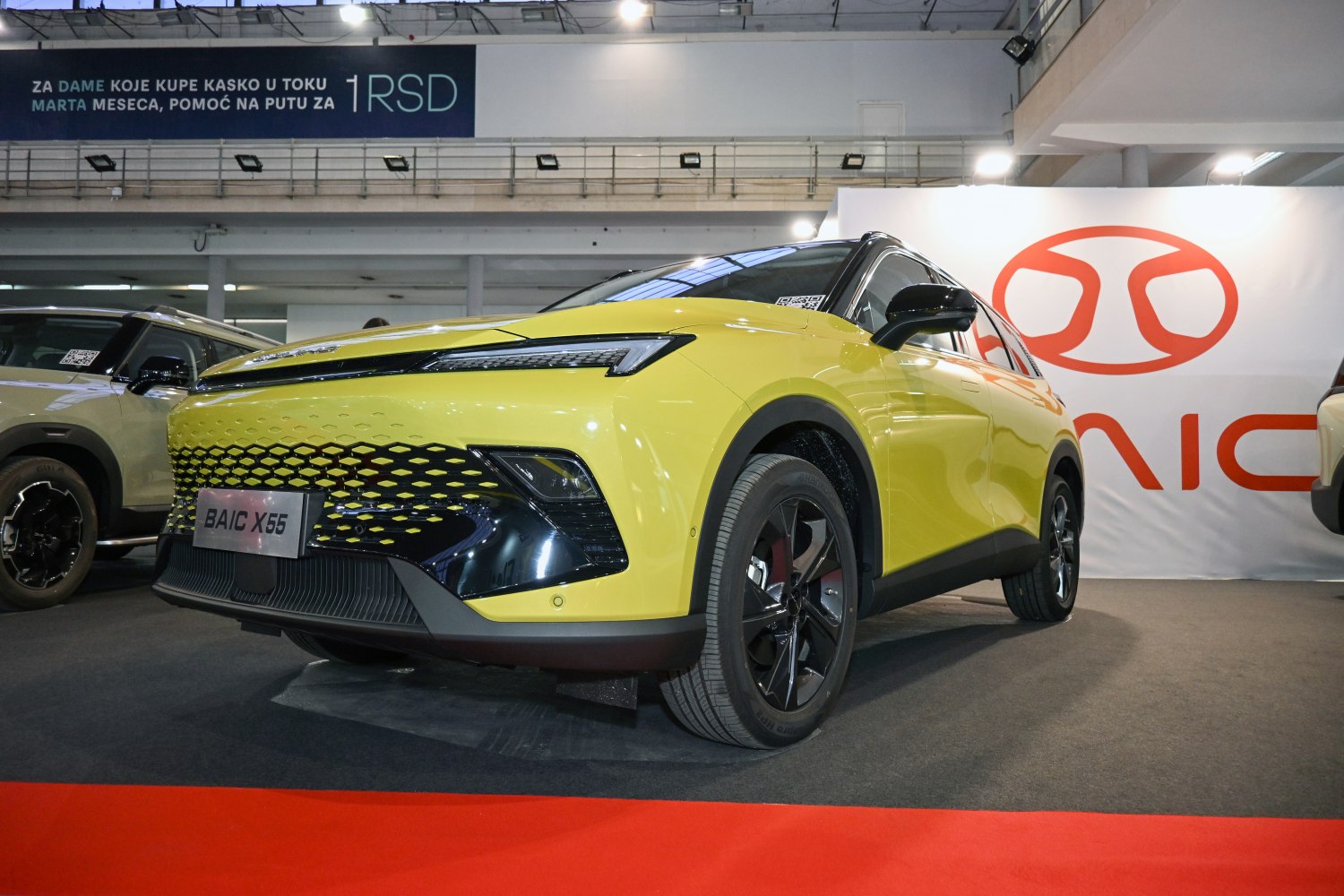 Close-up of SUV front grille and sharp LED headlights