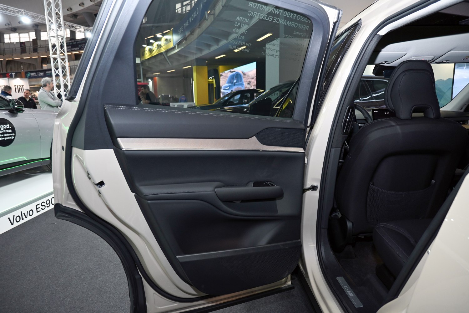 Rear door panel with premium materials and ergonomic handle