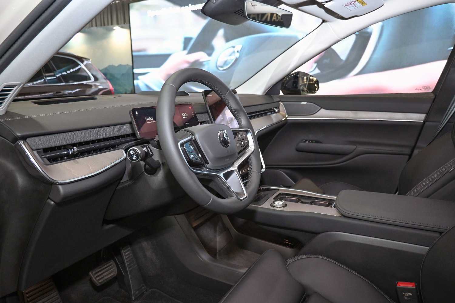 Digital dashboard and multifunction steering wheel in car interior