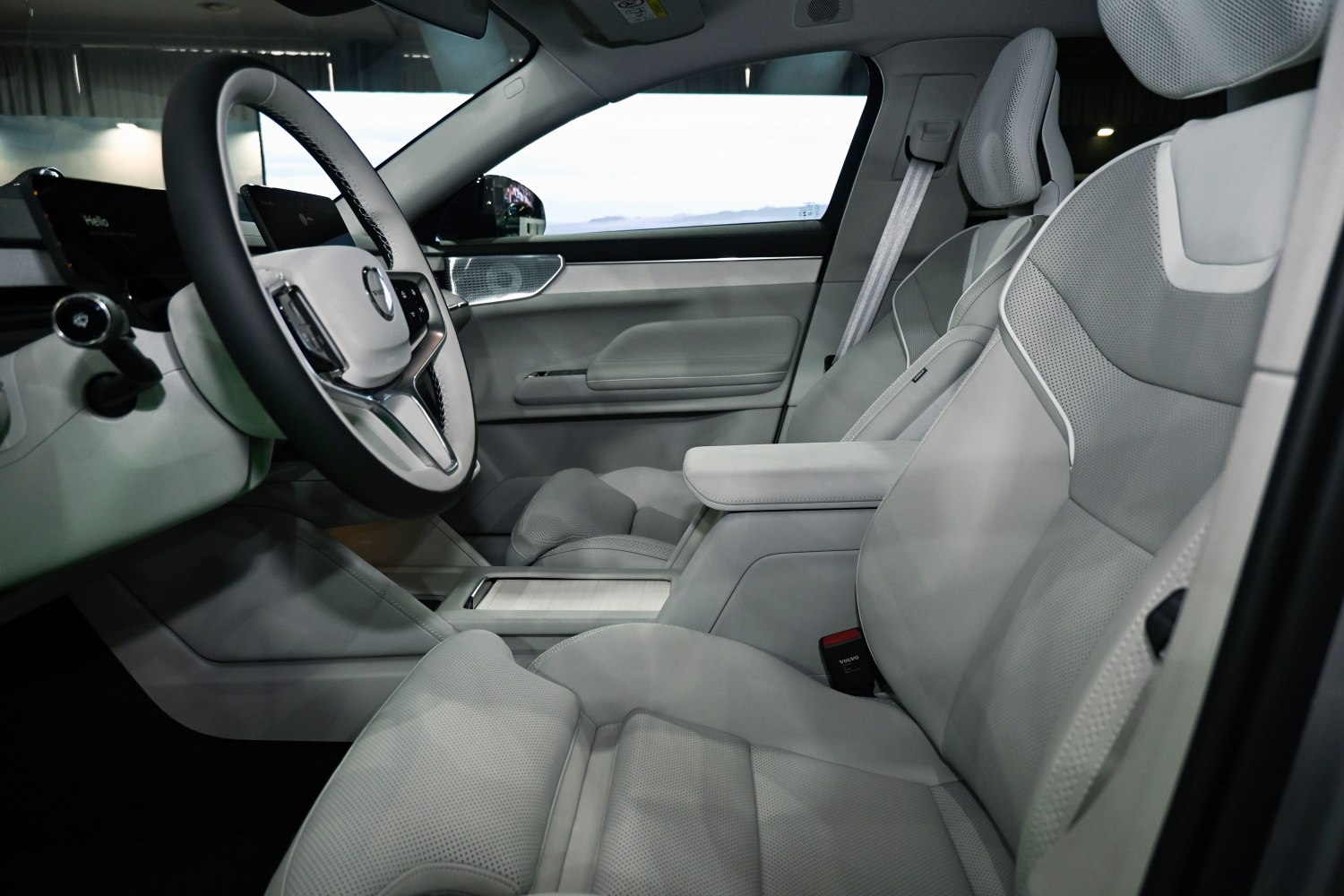 Spacious ergonomic seats and modern steering wheel with controls