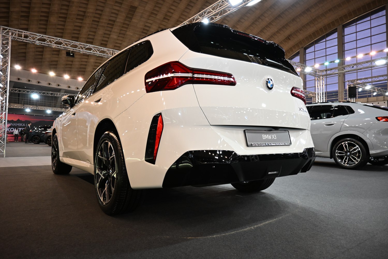 Rear view with LED taillights and black bumper detailing.