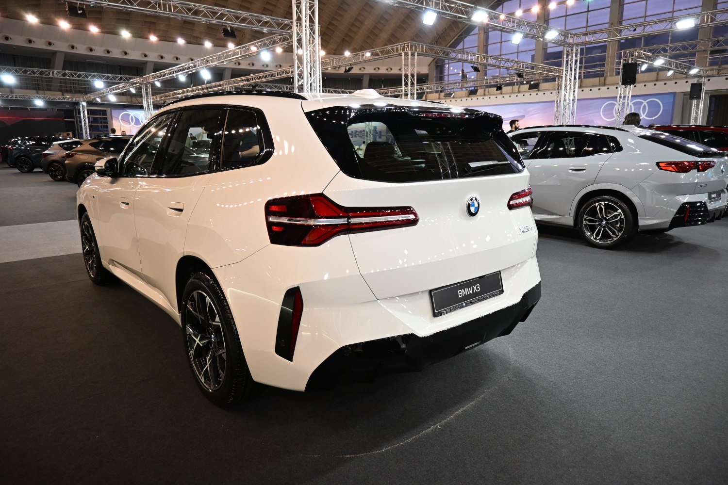 Rear view of luxury SUV with LED taillights and black roof
