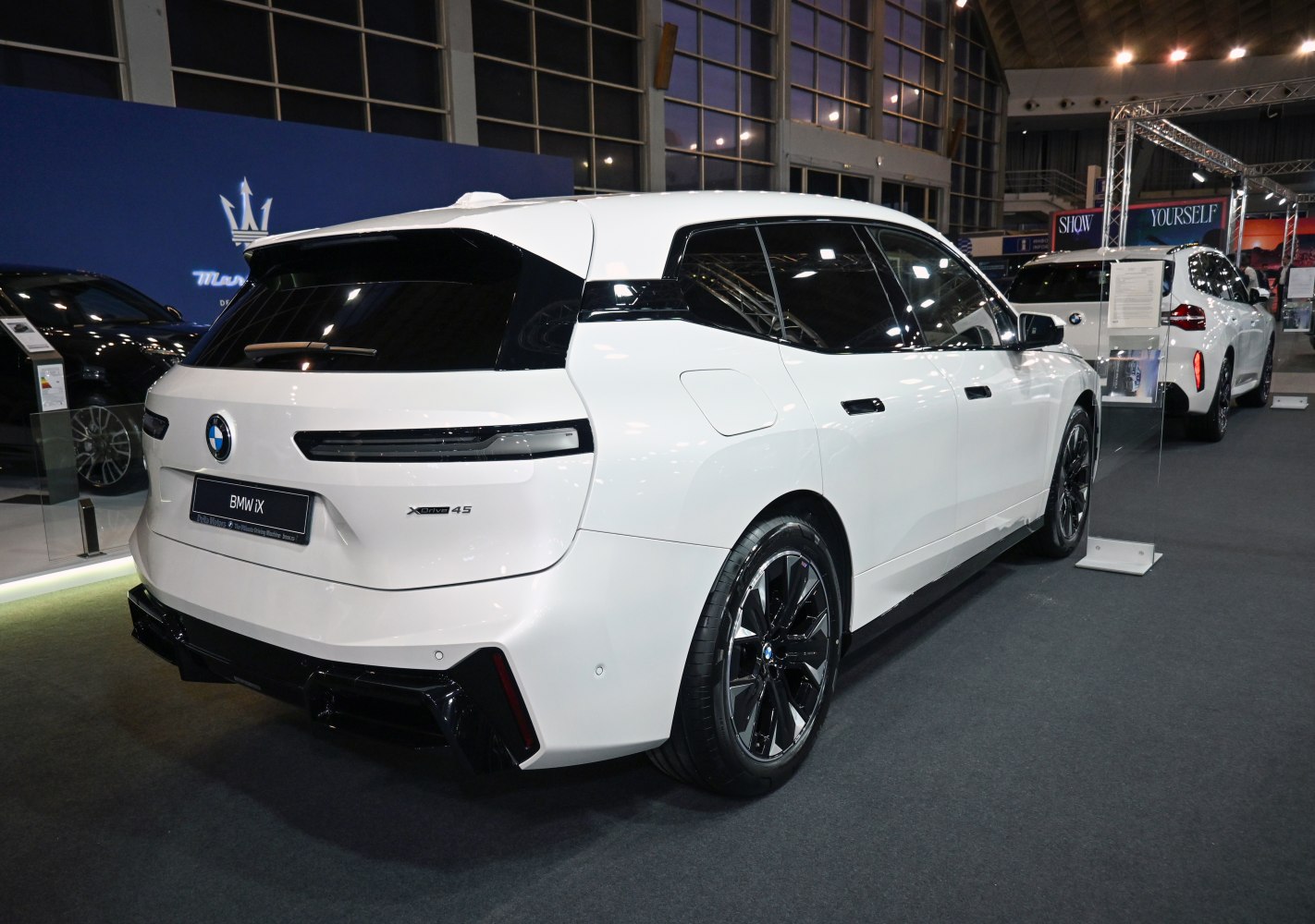 Rear view with sleek taillights and black wheels