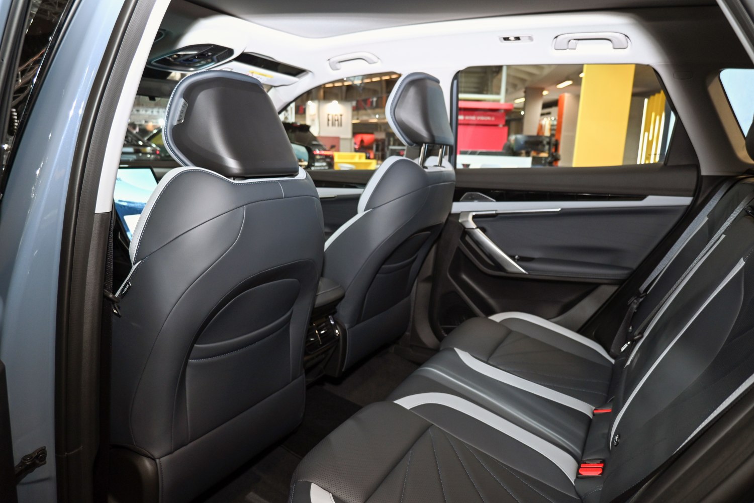Spacious rear seating with black and gray leather upholstery