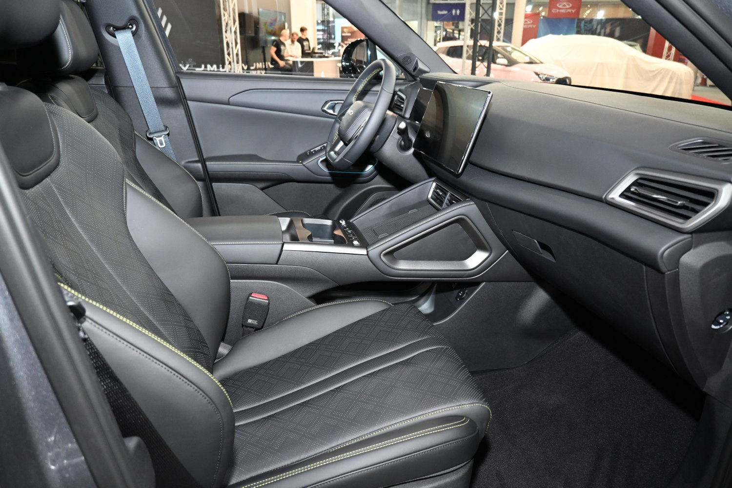 Premium car interior with large touchscreen and stylish seats
