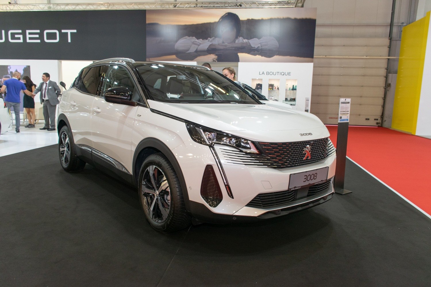 Front and side view with LED headlights and modern SUV design.