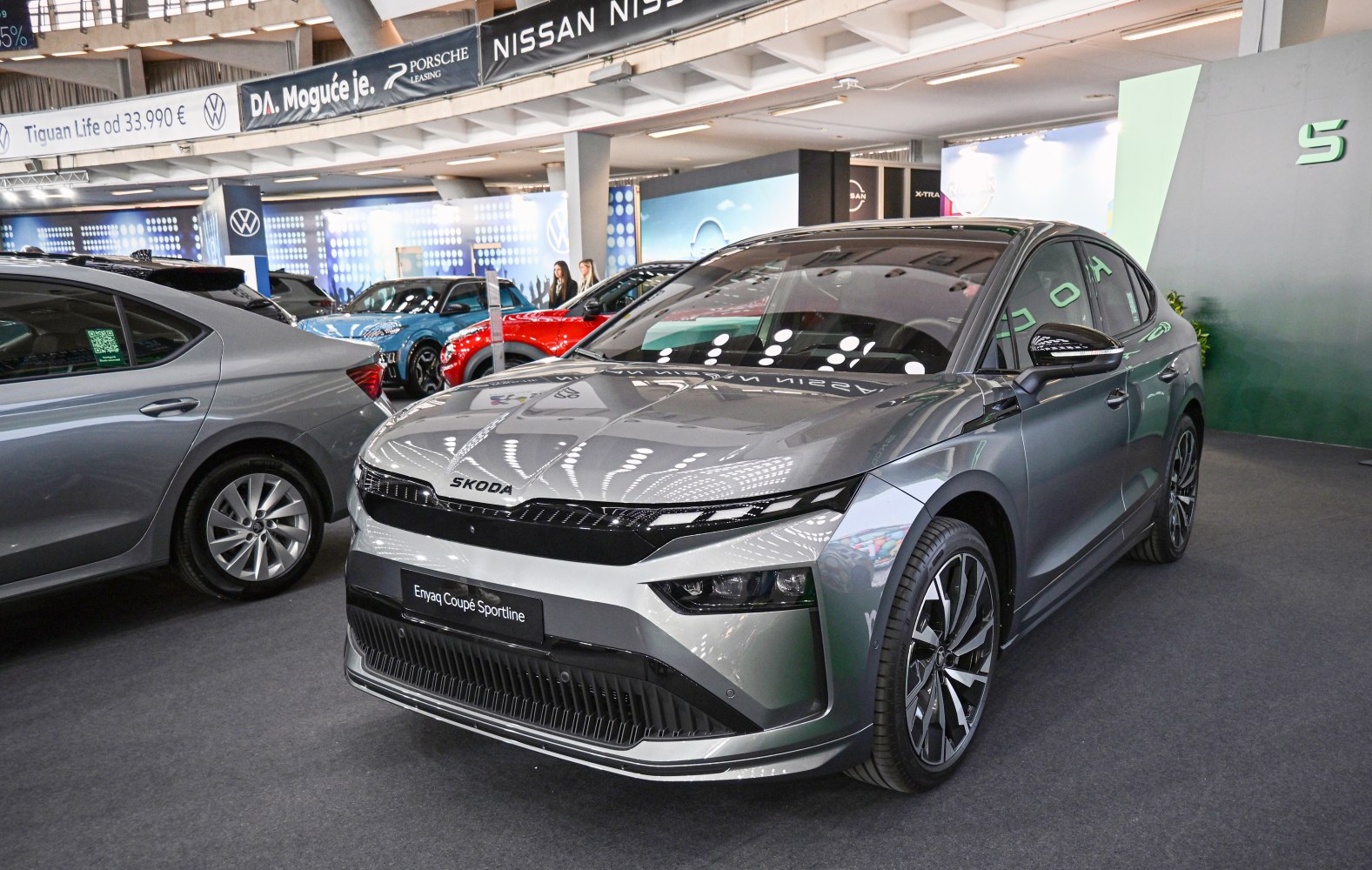 Front view with sleek LED headlights and sporty alloy wheels