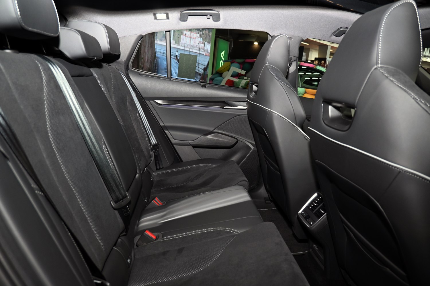 Rear seat interior with premium leather and fabric upholstery