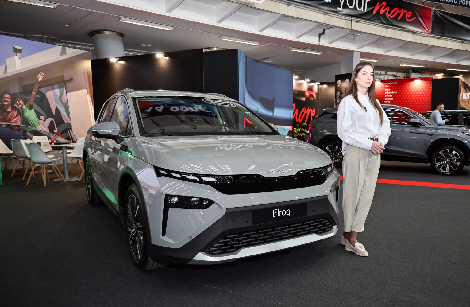 Front view of sleek electric crossover SUV with LED lighting