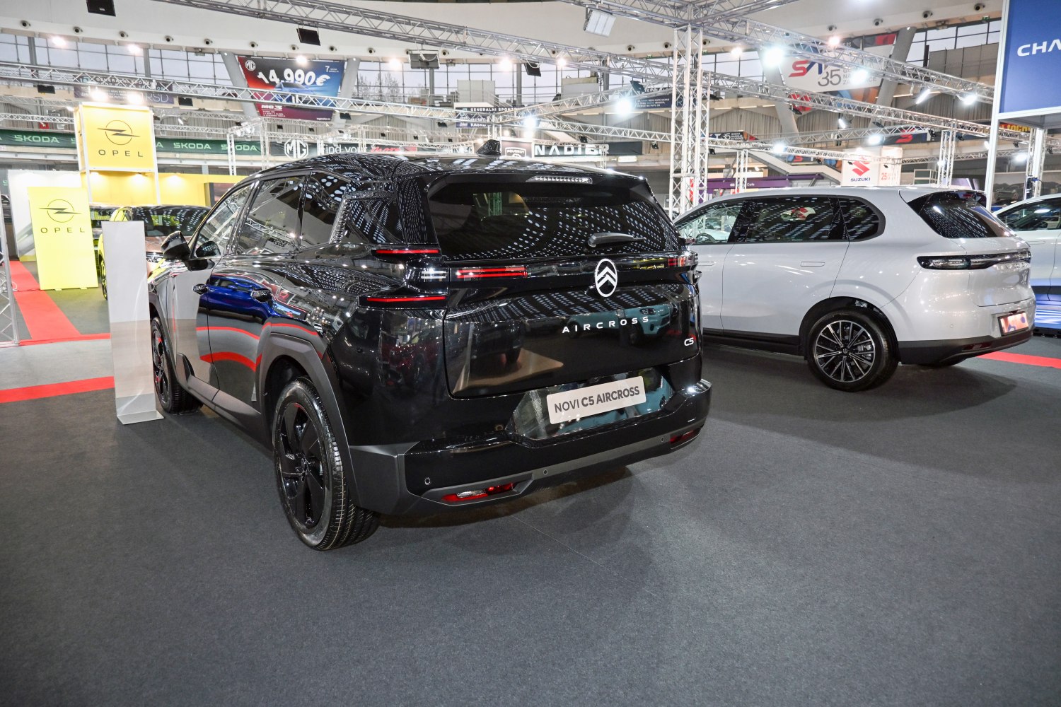 Rear design and lighting of a sleek black SUV