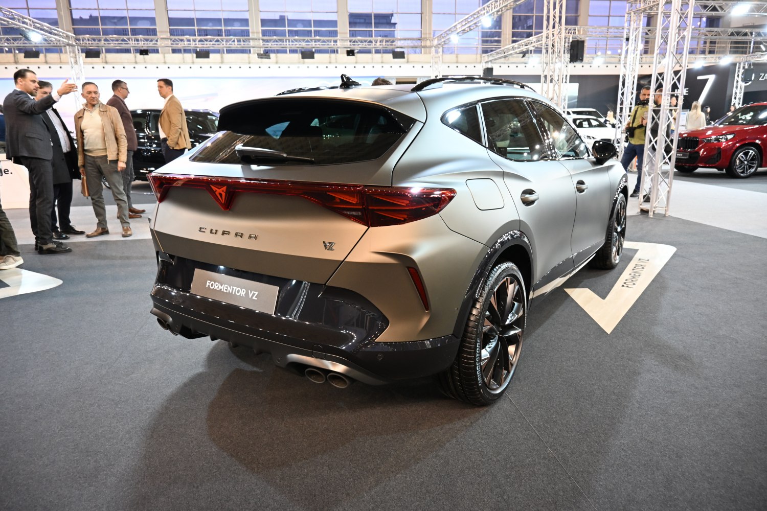 Rear view of sporty SUV with LED taillights and quad exhaust pipes