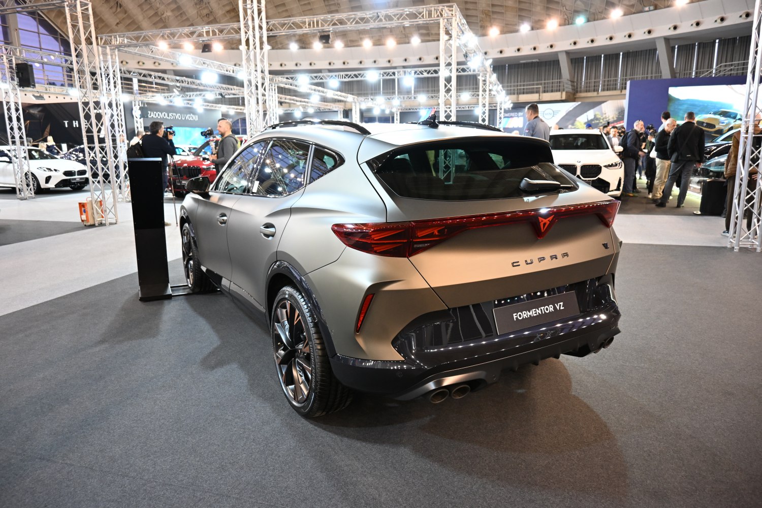 Rear SUV with sleek taillights and quad exhaust pipes