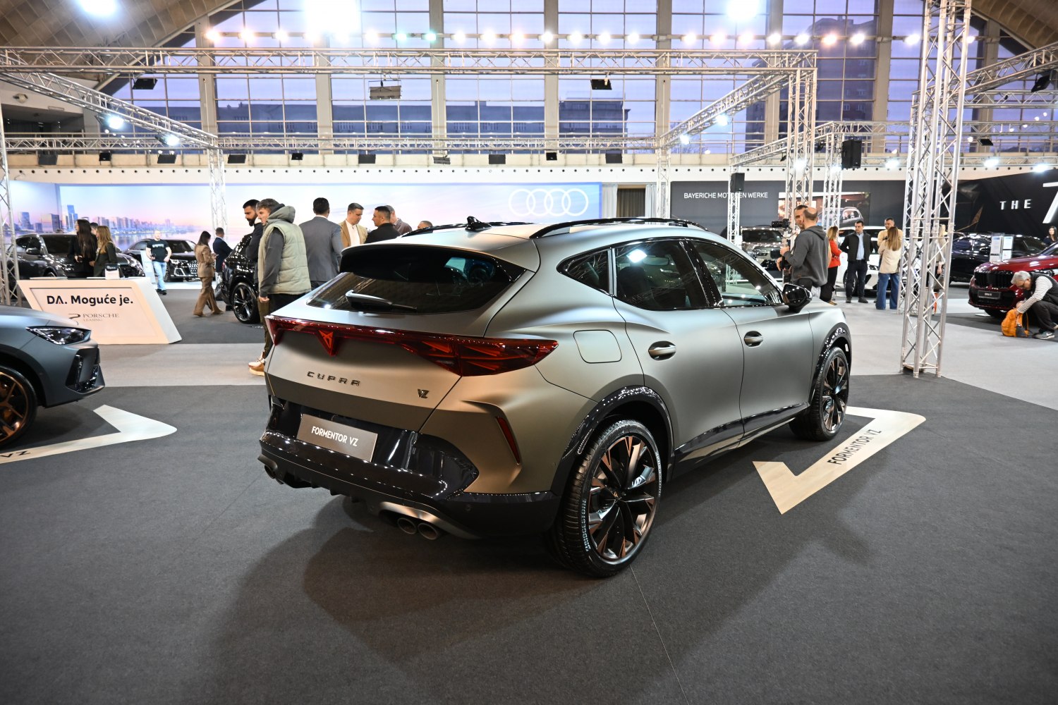 Rear and side profile with taillights, quad exhausts, alloy wheels