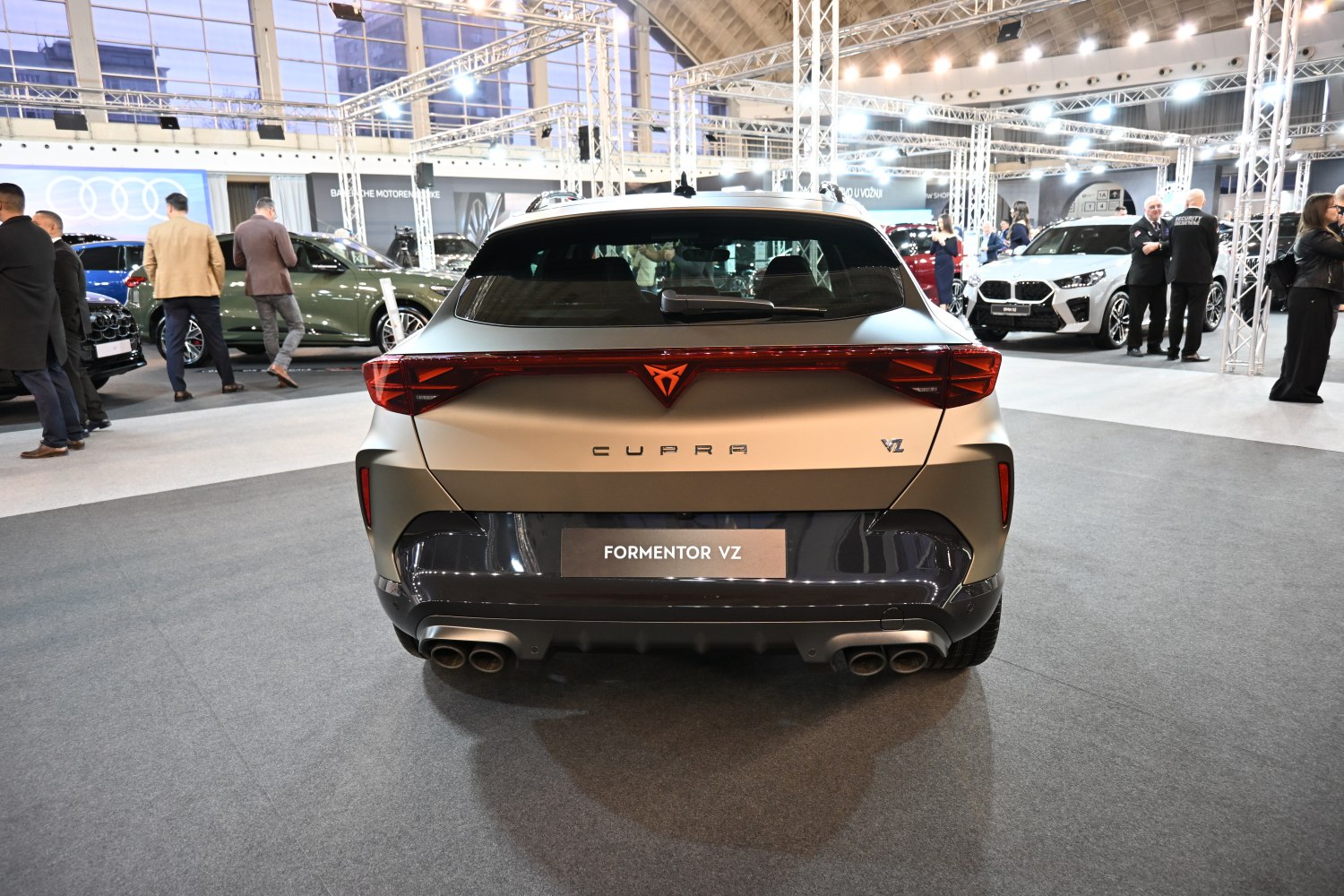 Rear view with quad exhausts, LED taillights, and sporty trim