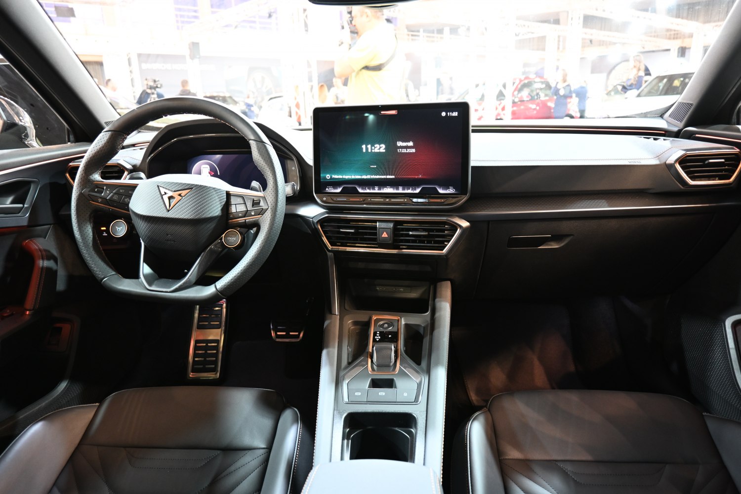 Interior with digital dashboard, multifunction steering wheel, and central touchscreen